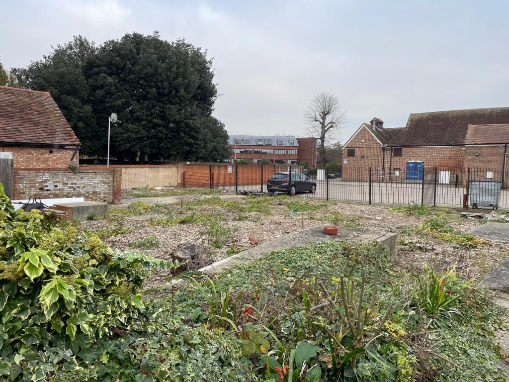 Lot: 66 - COMMERCIAL INVESTMENT LAND - The parcel of land has a gate in the far corner opening to the service yard